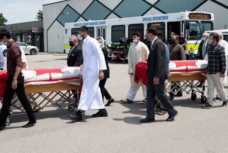 Mourners and supporters gather for the funeral of the Afzaal family members. (Photo: John Densky, via Anadolu Agency)