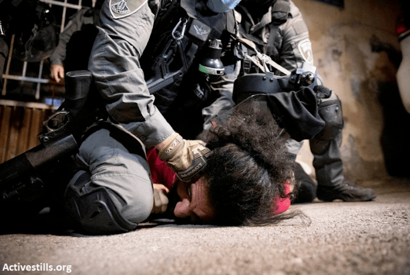 Israeli forces suppress a Palestinian protest against house evictions in Sheikh Jarrah. (Photo: Activestills)